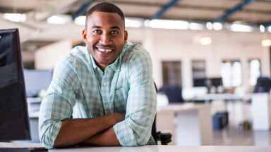 Office employee smiling.