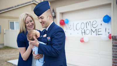 Airman and wife with baby